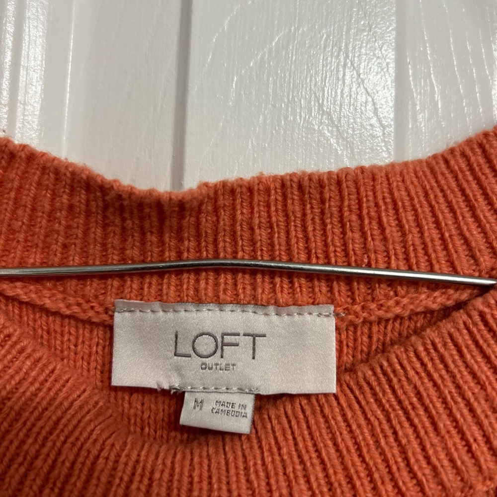 Orange knitting vest